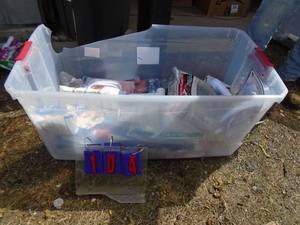 Tub of plumbing supplies. As shown.