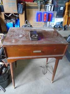 Singer sewing machine. As shown.