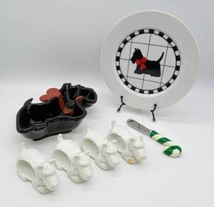 lot 33 image: Scotty Dog Ceramic Candy Dish, Napkin Rings, Striped Cheese Knife and Small Plate