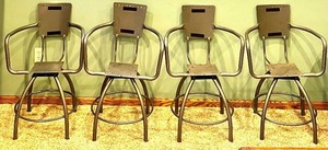 lot 301 image: 4 Industrial Rustic Metal Swivel Chairs with Red Suede-Like Char Seat Cushions and Back Rest Pillows