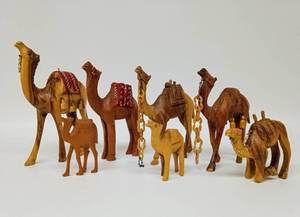 lot 248 image: Vintage Collection of Seven Small Wooden Camels
