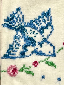 lot 306 image: Vintage Handmade Embroidered and Crocheted Blue Bird Pillow Cases