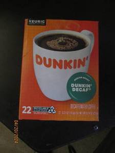package of dunkin decaf 22 pods in package best by date of august 2024