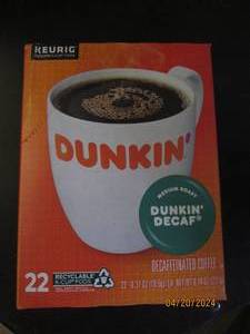 package of dunkin decaf 22 pods in package best by date of august 2024