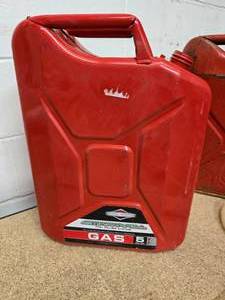 2 Metal gas cans - 5 gals  with syphin