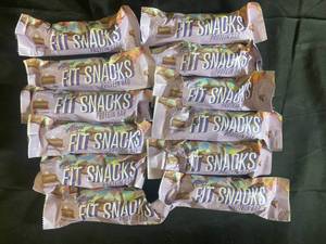 lot 231 image: Alani Fit Snacks Protein Bars Chocolate Cake Flavor - 12-Pack Best by 06212024
