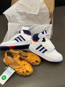 CT 5.   2 Pair kids shoes.  Size 10