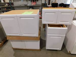 lot 66 image: Hampton Bay Hampton Assembled Kitchen Cabinet in Satin White Lot of 13 Items.