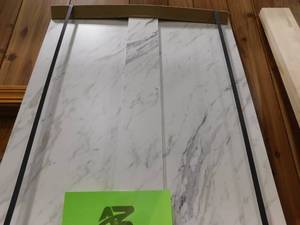 lot 99 image: THINSCAPE 8 ft. L x 25 in. D Engineered Composite Countertop in Calcutta Blanc with Satin Finish