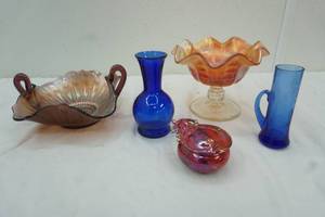 lot 37 image: Marigold Carnival Glass Candy Stem Dish, Fenton Stippled Rays Purple carnival glass and 2 small blue vases and a trinket box