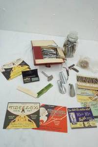 lot 95 image: Vintage aluminum hair curlers, vintage hair net advertising, shaver and more