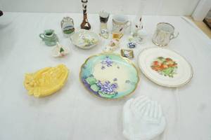 lot 96 image: Jewerly holders yellow and white, strawberry decor plate, variety of small trinkets and more