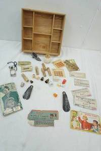 lot 101 image: Box with dividers, buttons, thimbals, shoe horn and more