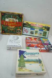 lot 114 image: Board Games John Deere Monopoly, Electronic Monopoly, Minnesota Trivia, Wikipedia Puzzel and Tripoley
