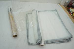 lot 166 image: Zodax Table Linens & Plastic protection roll (been used)