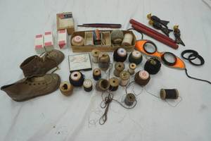 lot 255 image: Antique spools, baby shoes, goggles and other