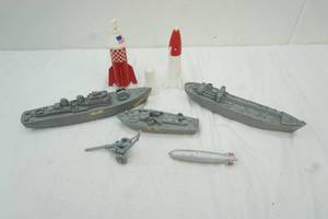 lot 233 image: Kids plastic toys, aircraft carriers and rockets