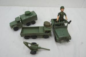 lot 236 image: Kids Army Plastic Toys, Jeep, Cannon, and two ary Trucks