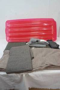 lot 305 image: Wool material and pink container