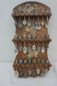 lot 336 image: Souviner spoons on rack