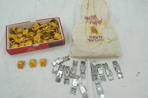lot 389 image: vintage seed bag clips