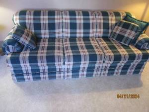 lot 13 image: Plaid three cushion sofa in tones emitting a comfortable aura for the home or cabin