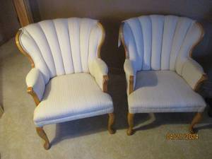 lot 15 image: Pair of Cream and Beige Upholstered Wingback style chairs