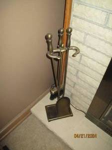 lot 17 image: Antique brass tone fireplace tools and stand