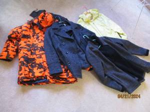 lot 19 image: Mens Large Winchester Blaze orange camo hunting jacket with matching hat plus Large casual coat along with a pair of womens size Xl outerwear coats