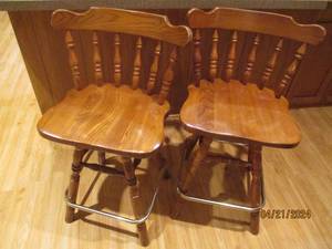 lot 34 image: Pair of wood Swivel style mid-back bar stools