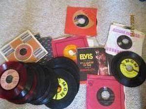 lot 49 image: Collection of 45s Vinyl Record Albums from artists such as Elvis and more