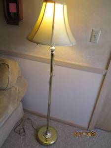 lot 53 image: Brass tone freestanding adjustable floor lamp