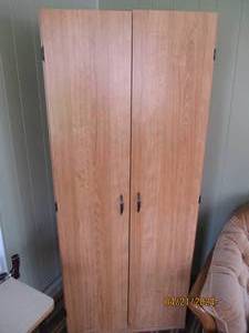 lot 56 image: 2-Door pantry style Storage cabinet with multiple adjustable interior shelves approximately 291672