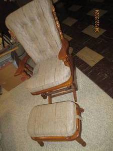 lot 72 image: Neutral tone Upholstered wood framed glider Rocker with matching Ottoman