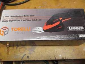 lot 104 image: Torelli 3.6v cordless garden shear...