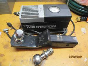 lot 107 image: Black and Decker air station plus class III receiver hitch along with a 1 78 and 2 ball