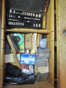 lot 119 image: Large variety of sanding supplies plus a ratchet and socket set