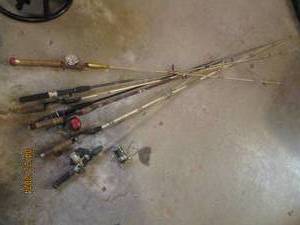 lot 137 image: Collection of Vintage fishing rods and reels