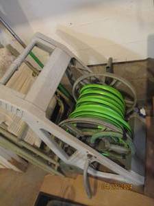 lot 141 image: Ames Hose King reel with attached garden hose
