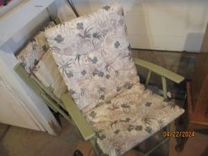 lot 142 image: Pair of metal framed and padded patio chairs