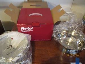 lot 150 image: New Parini 3.5qt Stainless Dutch oven and steamer with lid