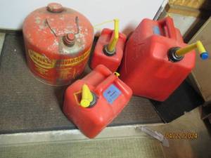 lot 166 image: Assortment of plastic and metal gas cans