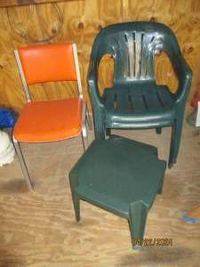 lot 178 image: Pair of plastic patio chairs with matching side table plus metal framed padded chair
