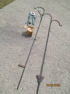 lot 185 image: Dual side shepherd hooks, wind chime and bird house