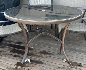 lot 208 image: Glass Top Patio Table with Four Chairs