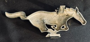 lot 245 image: Vintage Ford Mustang Logo Car Part