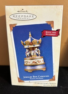 lot 248 image: Three Carousel and Rocking Horse Ornaments