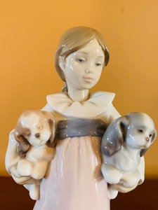 lot 60 image: Lladro Arms Full of Love Girl with Two Dogs Figurine