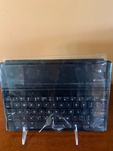 lot 79 image: Collection of Small Electronics Including a New Tracfone, Wireless Keyboard and More