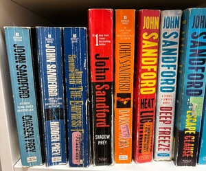 lot 141 image: Variety of John Sanford Books